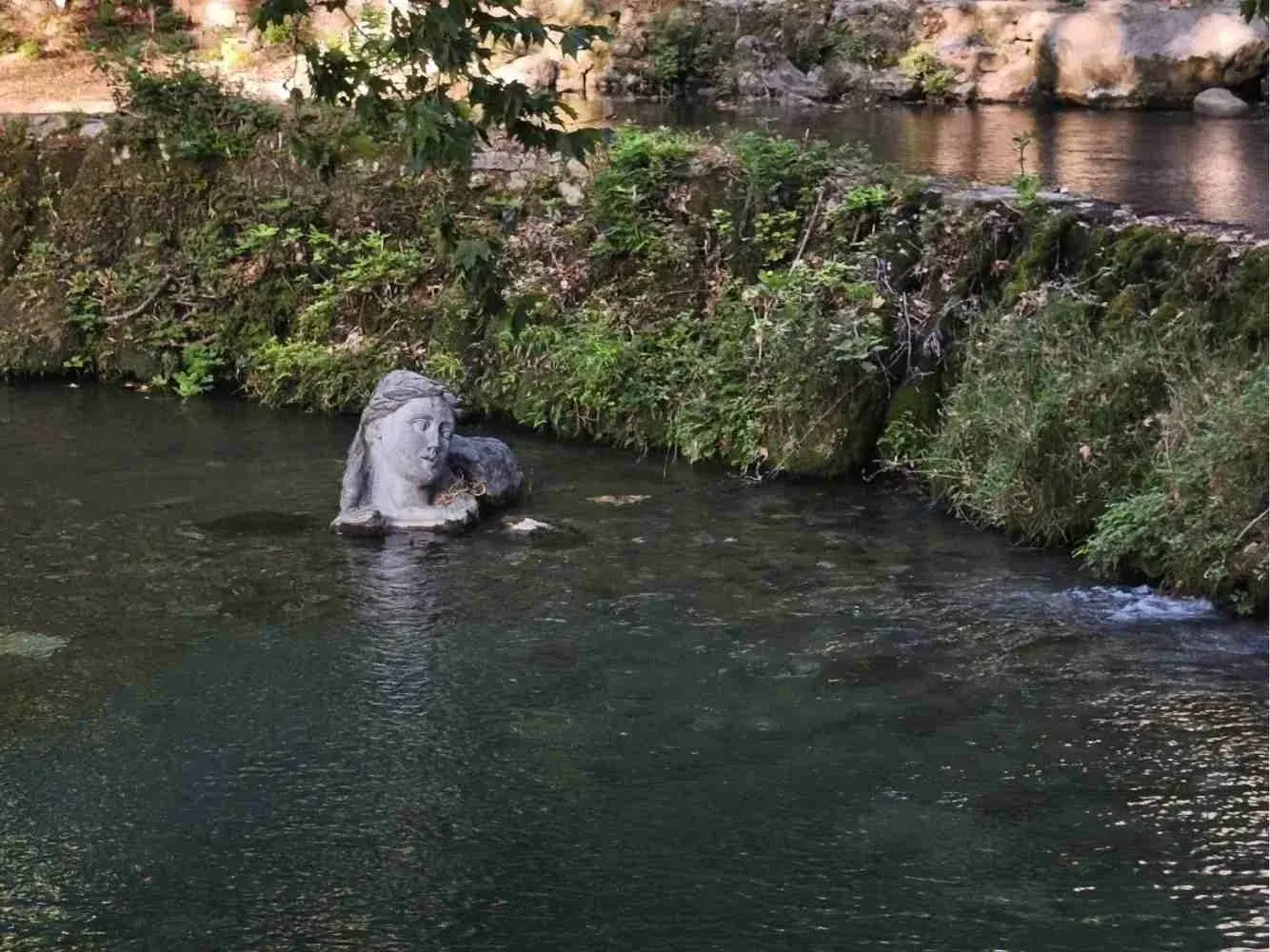 The Erkina statue in the river