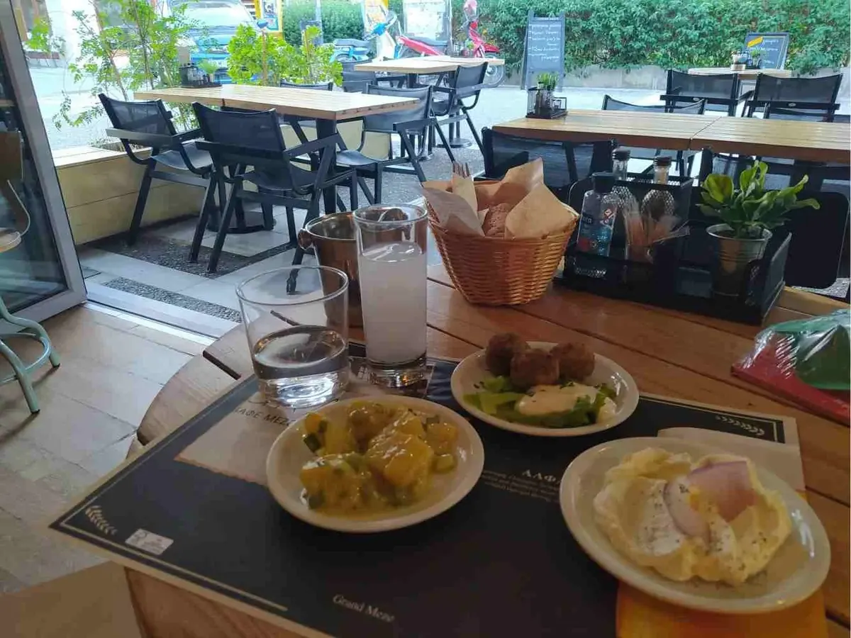 Ouzo and meze at a table in Livadia